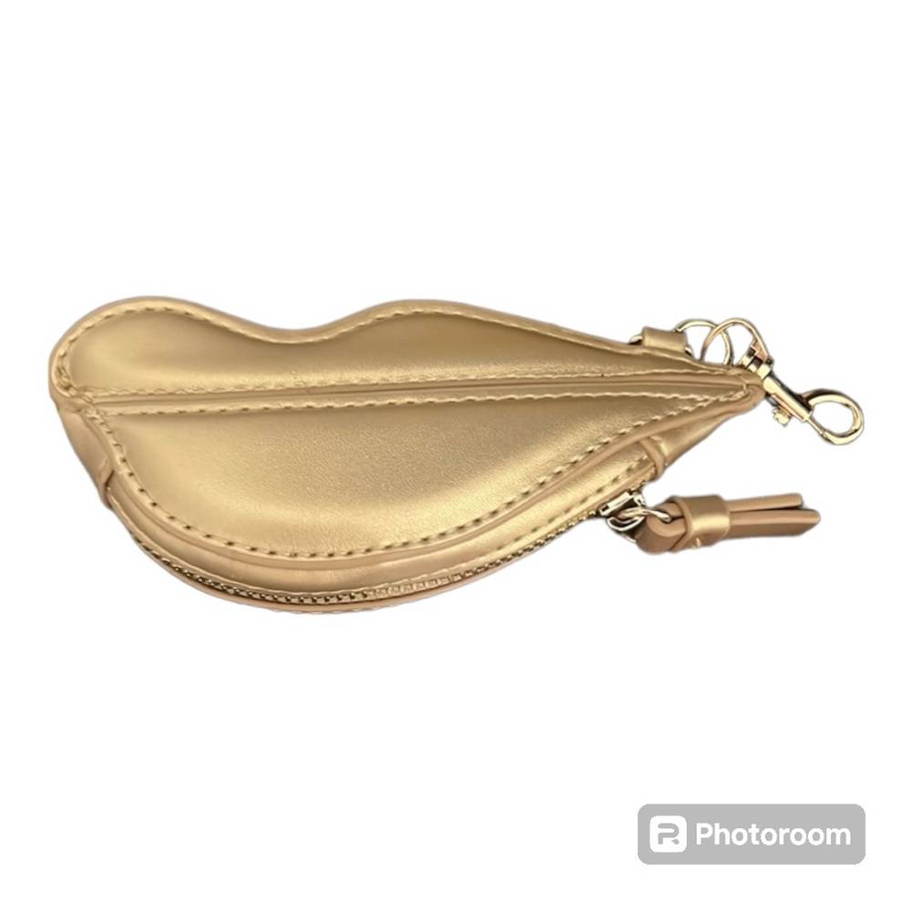 Diane von Furstenburg x Target collab gold lip coin pouch